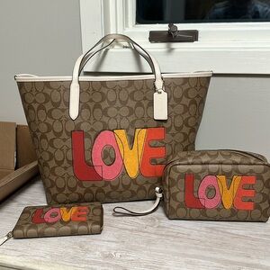 🥰 Coach love tote . Wallet and pouch to match. Perfect for Valentine’s Day!